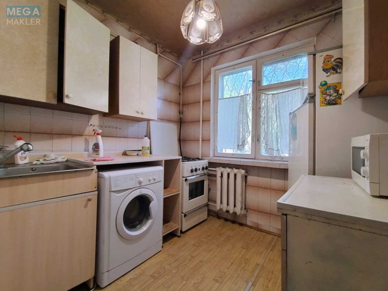 Продаж 3 кімнатної квартири (57/40/6), 1 пов. 5 пов. будинку, <a class="location-link" href="/kiev/" title="Недвижимость Київ">Київ</a>, <a class="location-link" href="/kiev/svyatoshinskij/" title="Недвижимость Святошинський район">Святошинський р-н</a>, Академіка Туполєва вул., 17в (изображение 1)