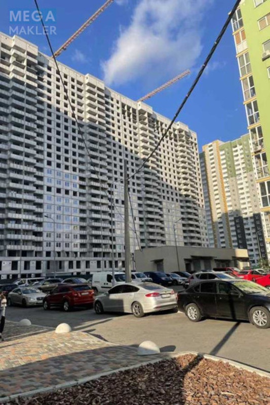 Новобудова, 25 поверхів, <a class="location-link" href="/kiev/" title="Недвижимость Київ">Київ</a>, <a class="location-link" href="/kiev/darnickij/" title="Недвижимость Дарницький район">Дарницький р-н</a>, Вінграновського Миколи вул., 6 (изображение 1)