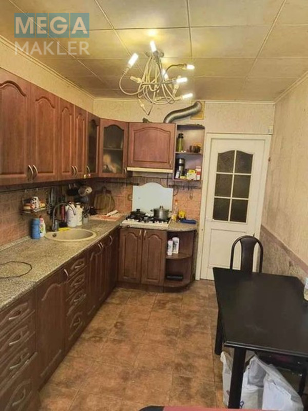 Продаж 3 кімнатної квартири (95/51/10), 1 пов. 9 пов. будинку, <a class="location-link" href="/kiev/" title="Недвижимость Київ">Київ</a>, <a class="location-link" href="/kiev/solomenskij/" title="Недвижимость Солом'янський район">Солом'янський р-н</a>, Ереванская ул., 10А ( <img src="https://megamakler.com.ua/metro/00ff00.gif" alt="" class="metro" /> м. Дорогожичи ) (изображение 1)