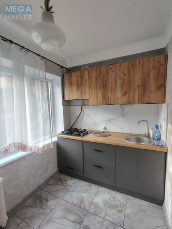 Оренда 1 кімнатної квартири, <a class="location-link" href="/kiev/" title="Недвижимость Київ">Київ</a>, <a class="location-link" href="/kiev/svyatoshinskij/" title="Недвижимость Святошинський район">Святошинський р-н</a>, Академіка Корольова вул., 10 (изображение 1)