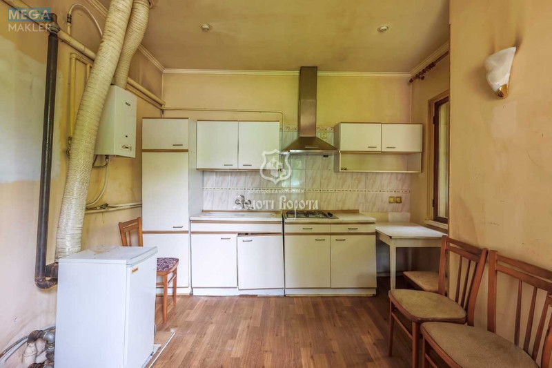 Продаж дома, 1&nbsp; поверх, 55,10&nbsp;кв.м, 2&nbsp;кімнати, ділянка 4,11&nbsp;сотки, <a class="location-link" href="/kiev/" title="Недвижимость Київ">Київ</a>, <a class="location-link" href="/kiev/svyatoshinskij/" title="Недвижимость Святошинський район">Святошинський р-н</a>, Соснова вул., 18 (изображение 11)