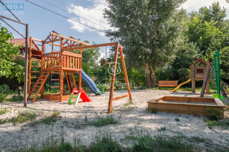 Продаж дома, 3&nbsp;поверху, 270&nbsp;кв.м, 5&nbsp;кімнат, ділянка 12,54&nbsp;соток, <a class="location-link" href="/kiev/" title="Недвижимость Київ">Київ</a>, <a class="location-link" href="/kiev/darnickij/" title="Недвижимость Дарницький район">Дарницький р-н</a>, Садова вул., 7/9 (изображение 22)