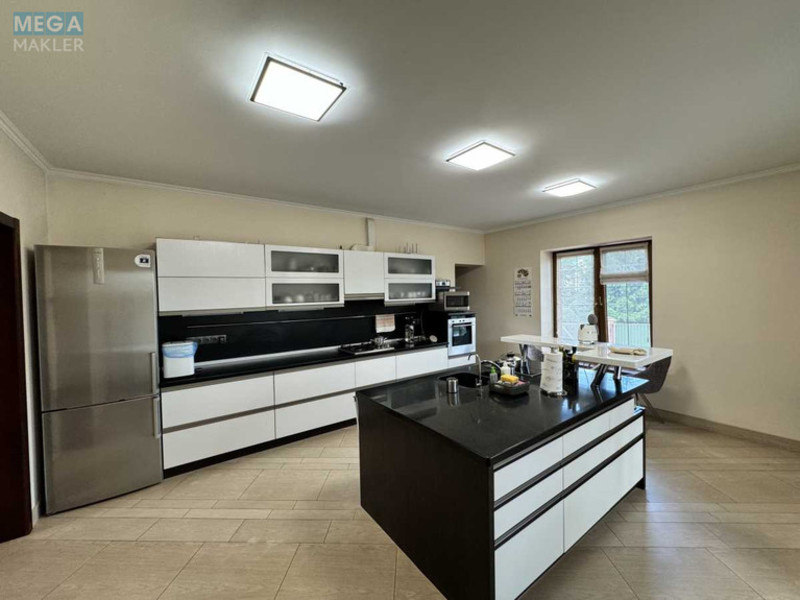 Продаж дома, 2&nbsp;поверху, 380&nbsp;кв.м, 4&nbsp;кімнати, ділянка 16&nbsp;соток, <a class="location-link" href="/kiev/" title="Недвижимость Київ">Київ</a>, <a class="location-link" href="/kiev/darnickij/" title="Недвижимость Дарницький район">Дарницький р-н</a>, Центральна вул. (изображение 9)
